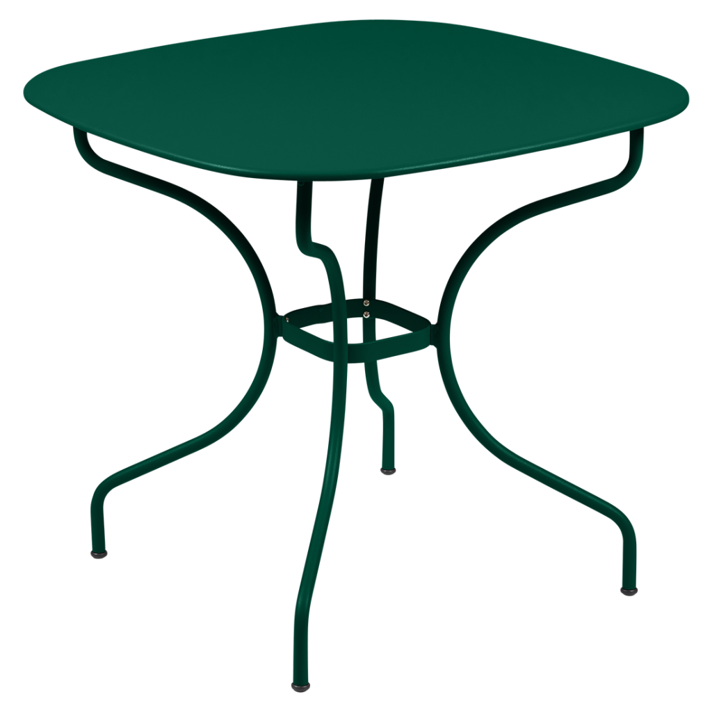 Une table verte avec une base en métal.