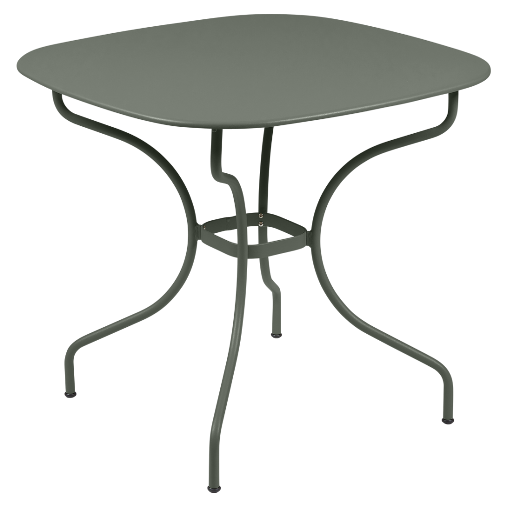 Une table avec une base en métal et un plateau vert.