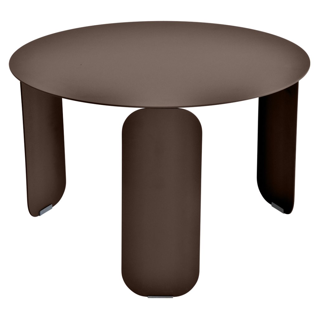 Une table ronde avec deux pieds et un plateau marron.