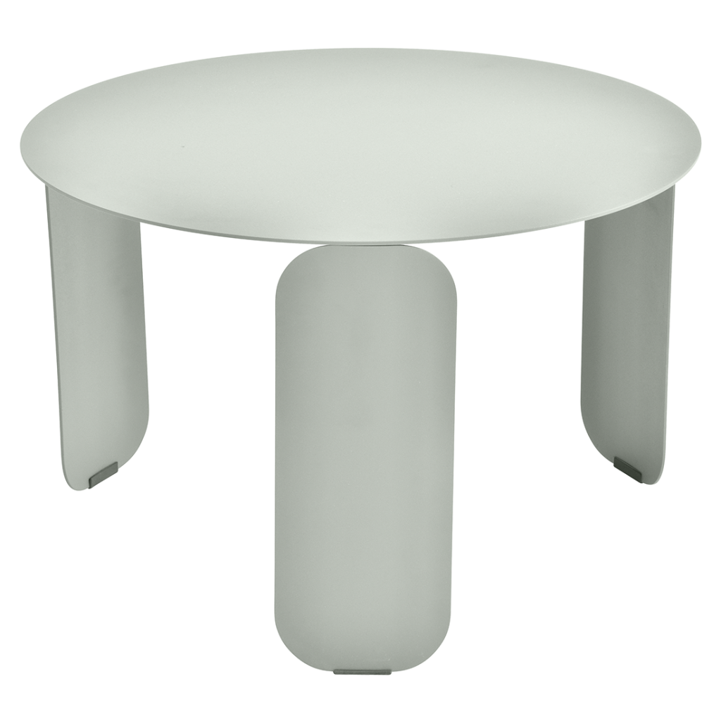 Une table ronde avec deux pieds et un plateau blanc.