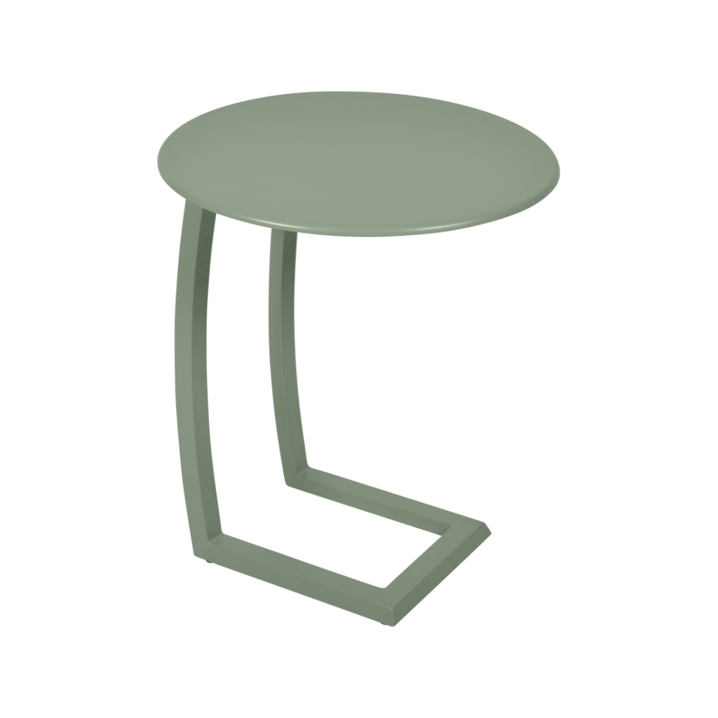 Une table d'appoint verte avec une base en métal.