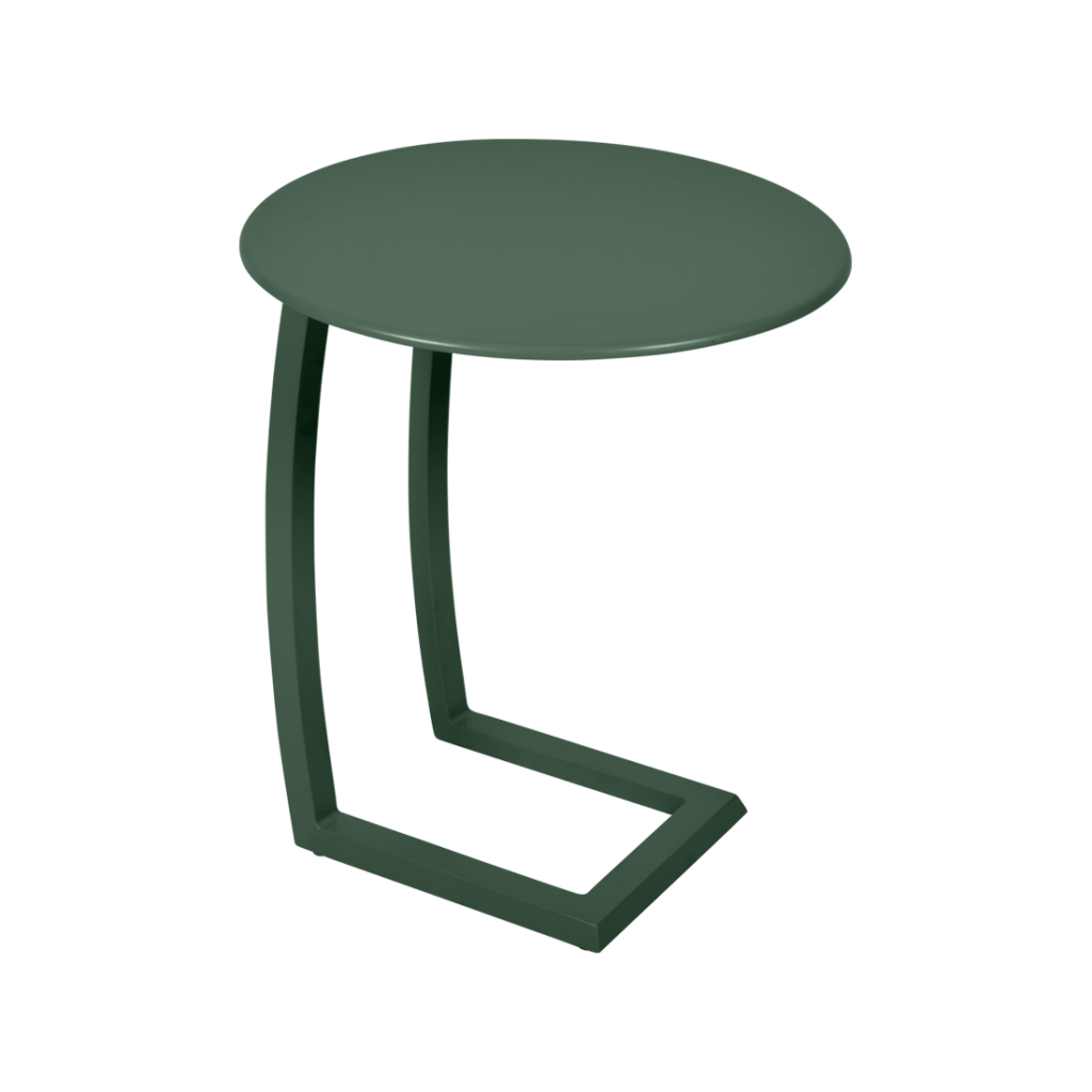 Une table d'appoint verte avec une base en métal.