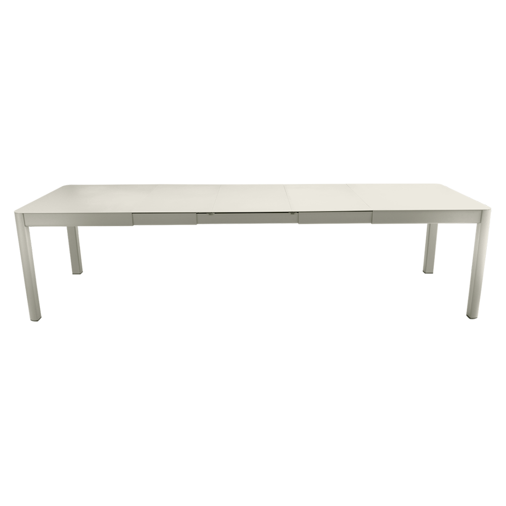 Une table à manger blanche avec une base en métal.