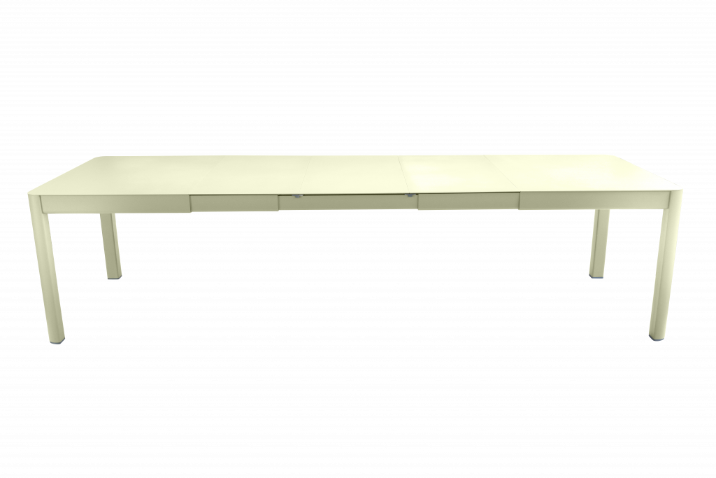 Une table à manger blanche sur fond noir.