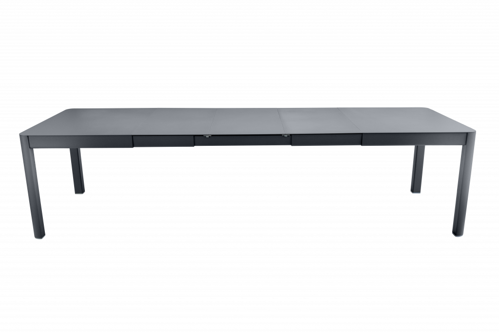 Une table à manger grise à deux pieds sur fond noir.