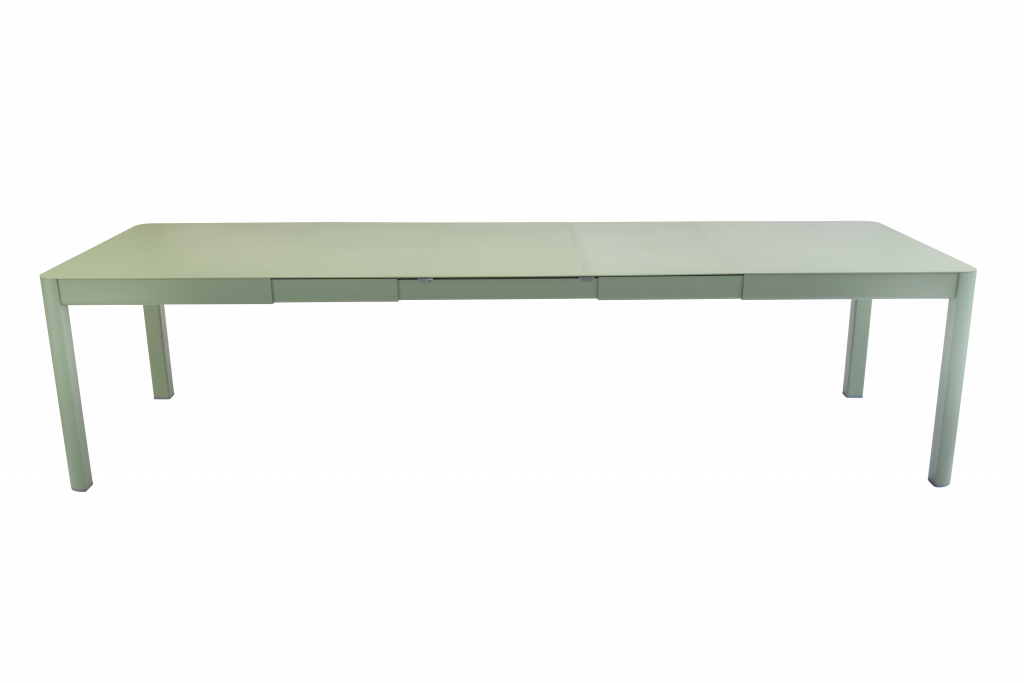 Une table à manger blanche sur fond noir.