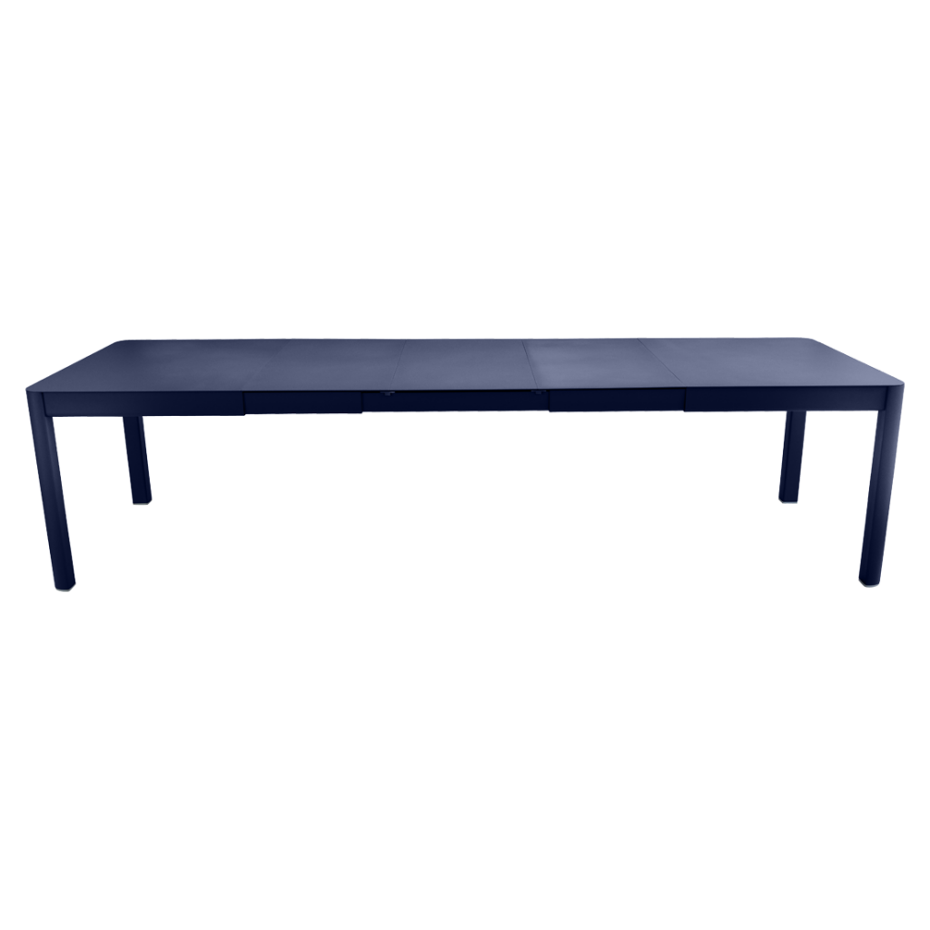 Une table à manger bleue avec un plateau noir.
