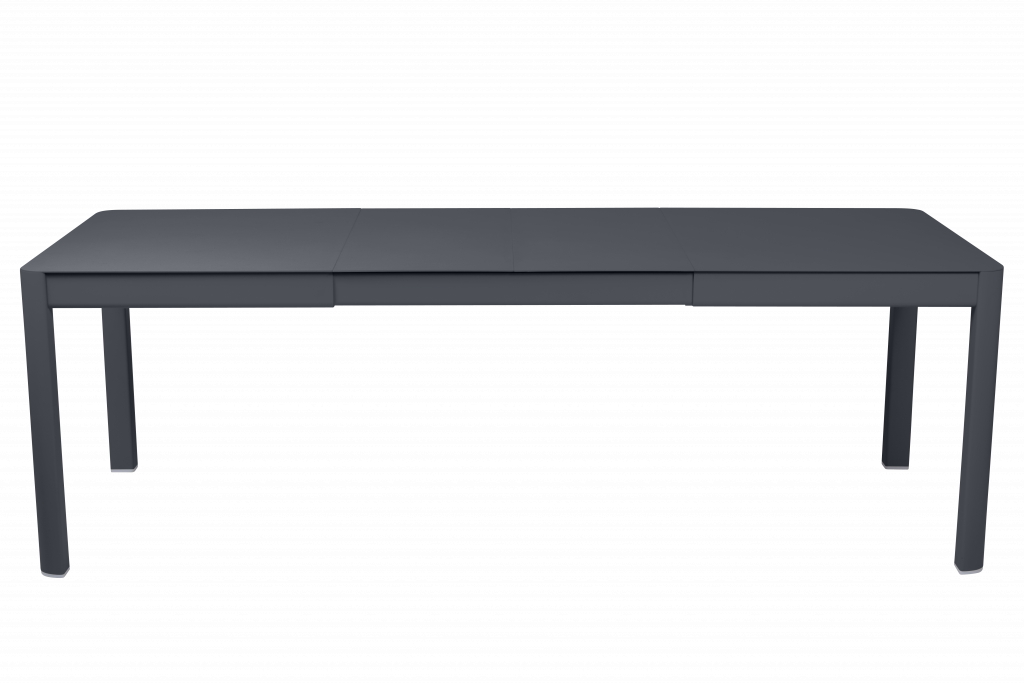 Image d’un bureau gris sur fond noir.