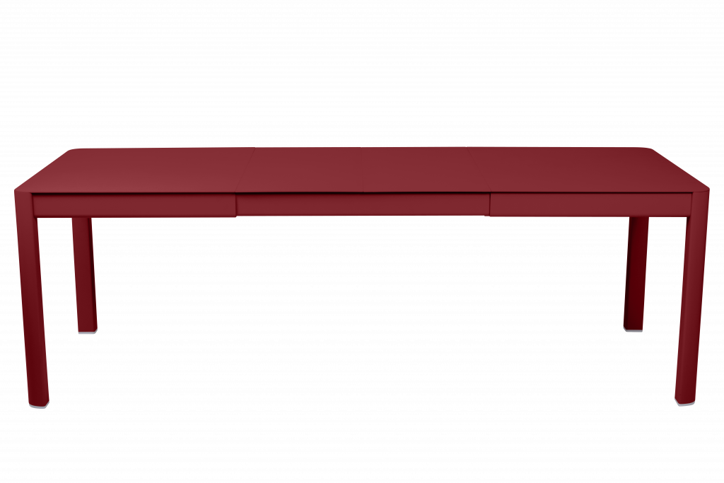 Un bureau rouge sur fond noir.