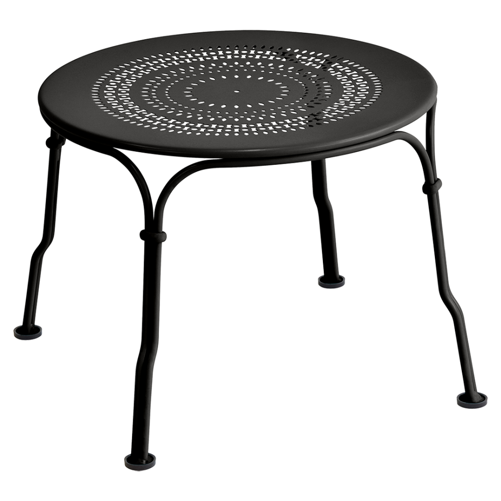 Une table en métal noir avec un plateau rond.