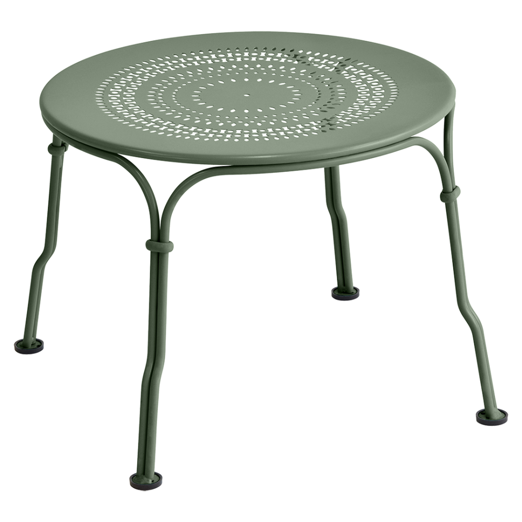 Une table en métal vert avec un plateau rond.