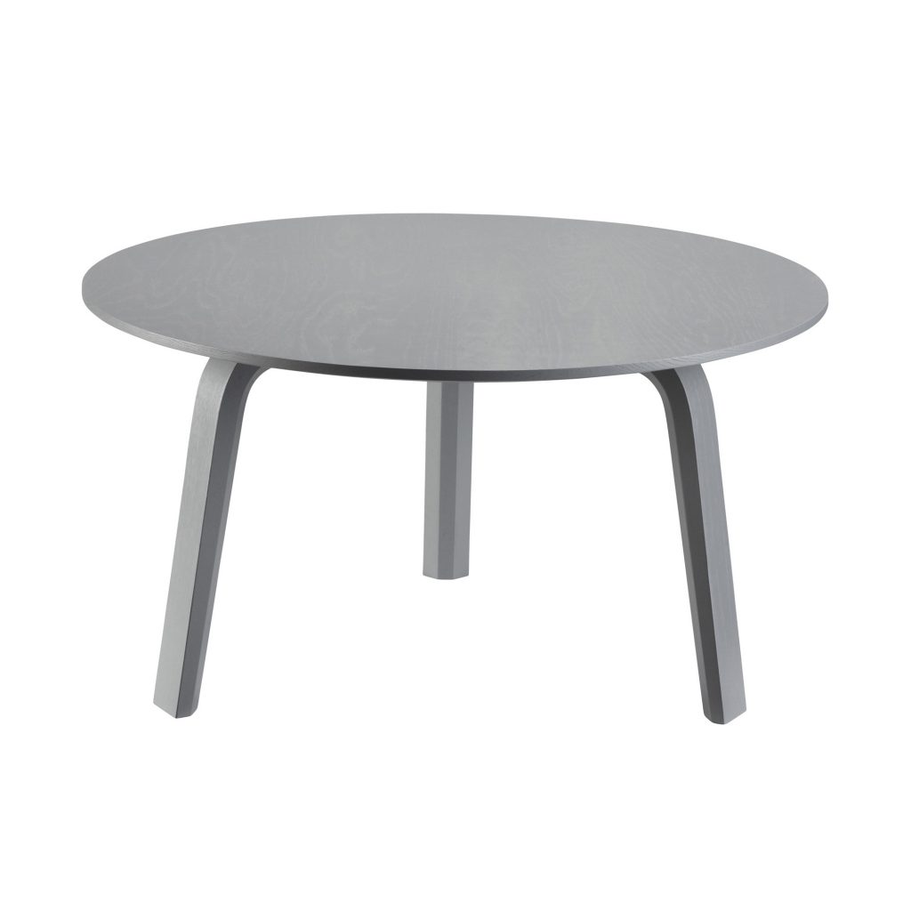 Une table ronde grise à deux pieds sur fond blanc.