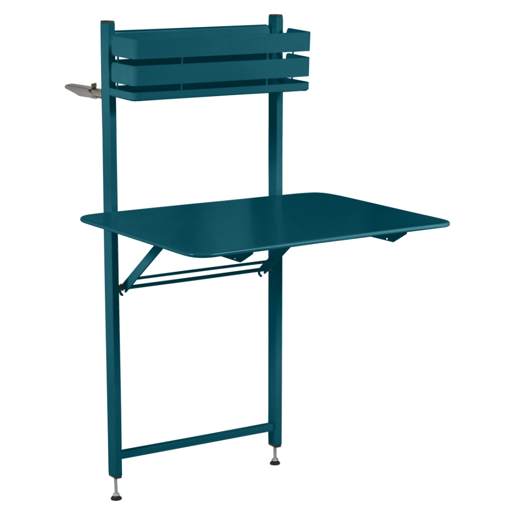 Une table bleu sarcelle avec une étagère dessus.