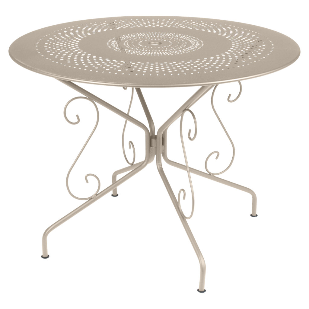 Une table ronde en métal au design floral.