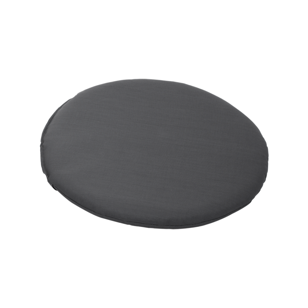 Un coussin rond noir sur fond blanc.