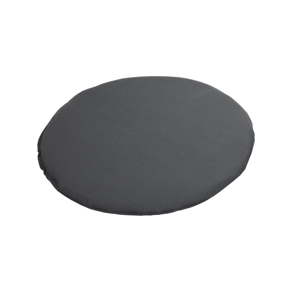 Un coussin rond noir sur fond blanc.