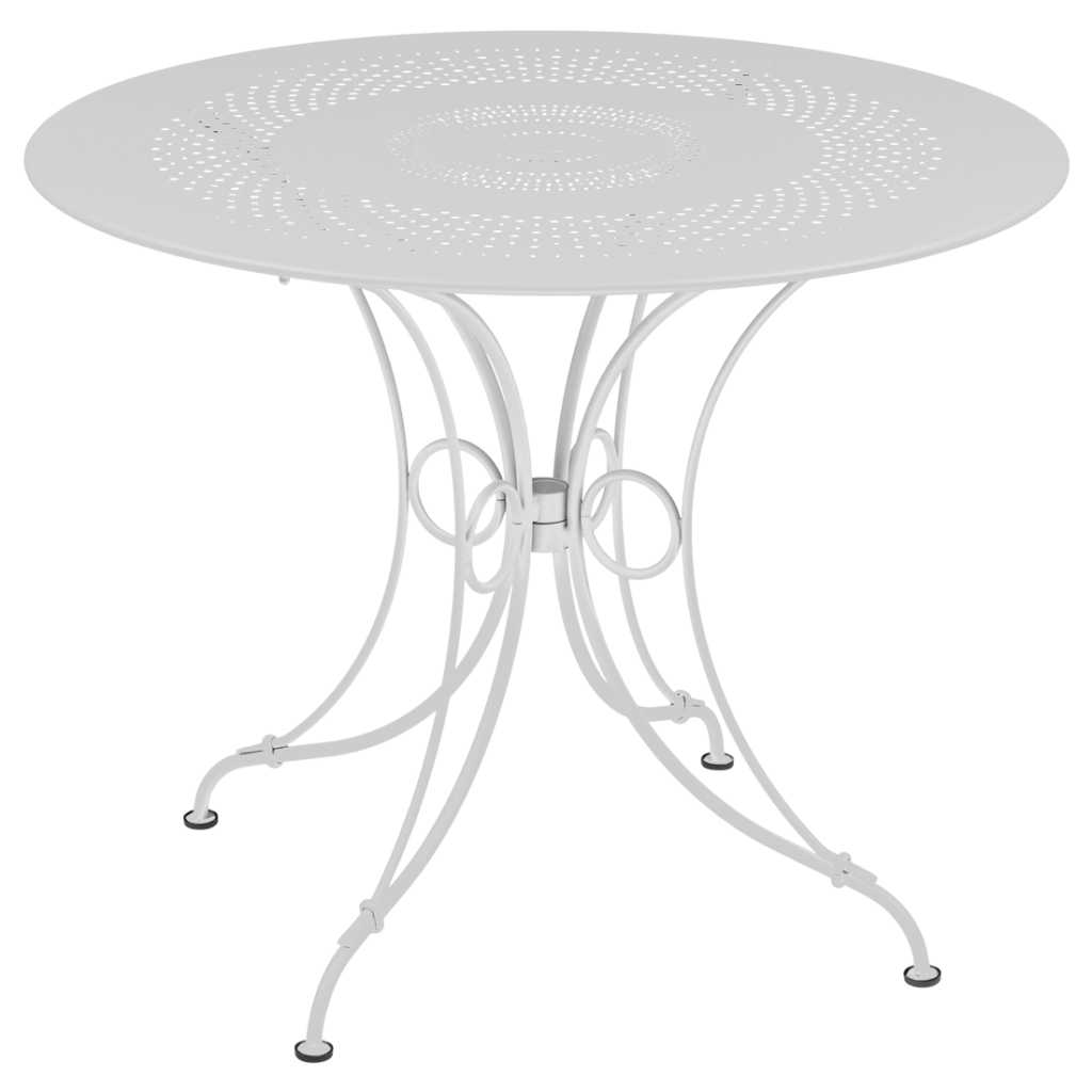 Une table en métal blanc avec un piètement en métal.
