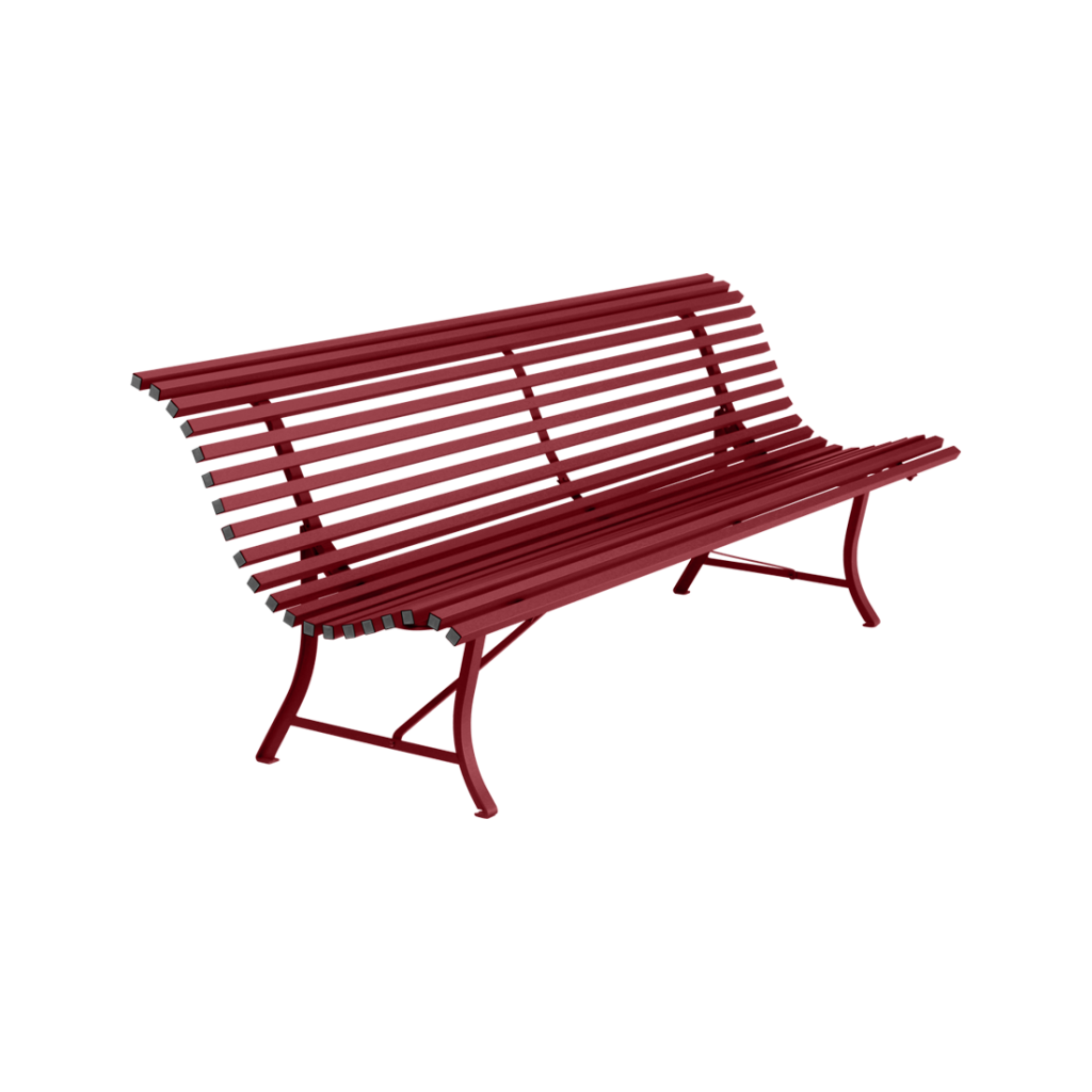 Un banc rouge sur fond blanc.