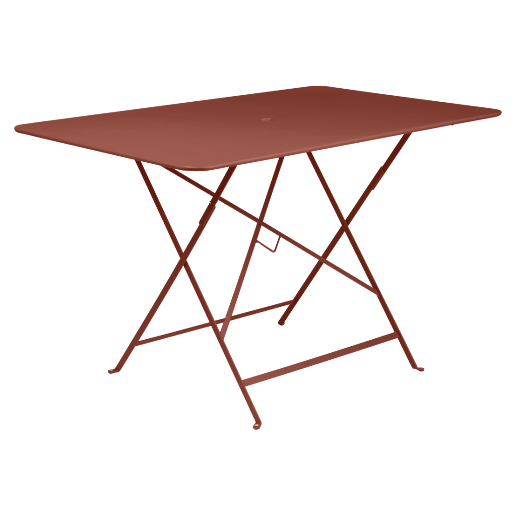 Une table pliante rouge sur fond blanc.