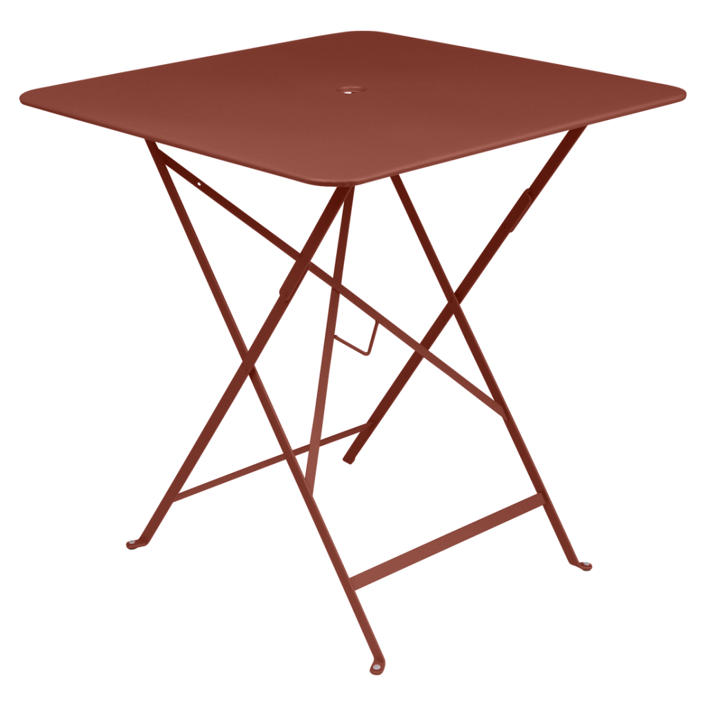 Une table pliante rouge avec une structure en métal.