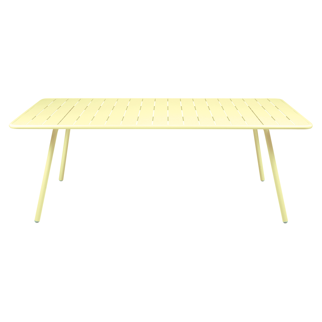 Une table jaune avec des pieds.