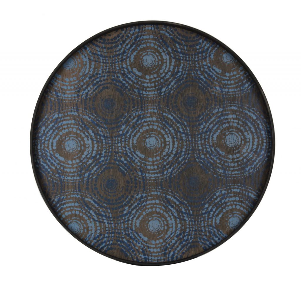 Un plateau rond avec des cercles bleus et marron dessus.
