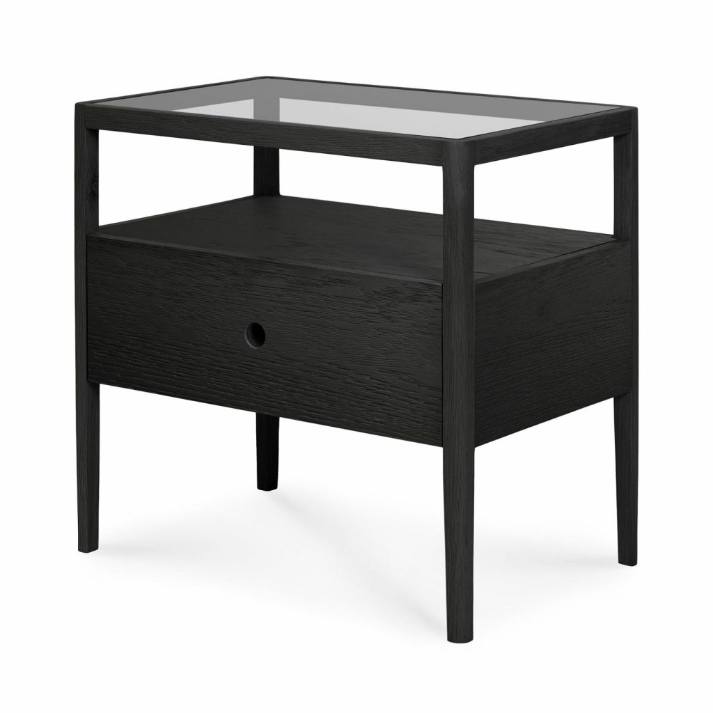 Une table de nuit noire avec un plateau en verre.