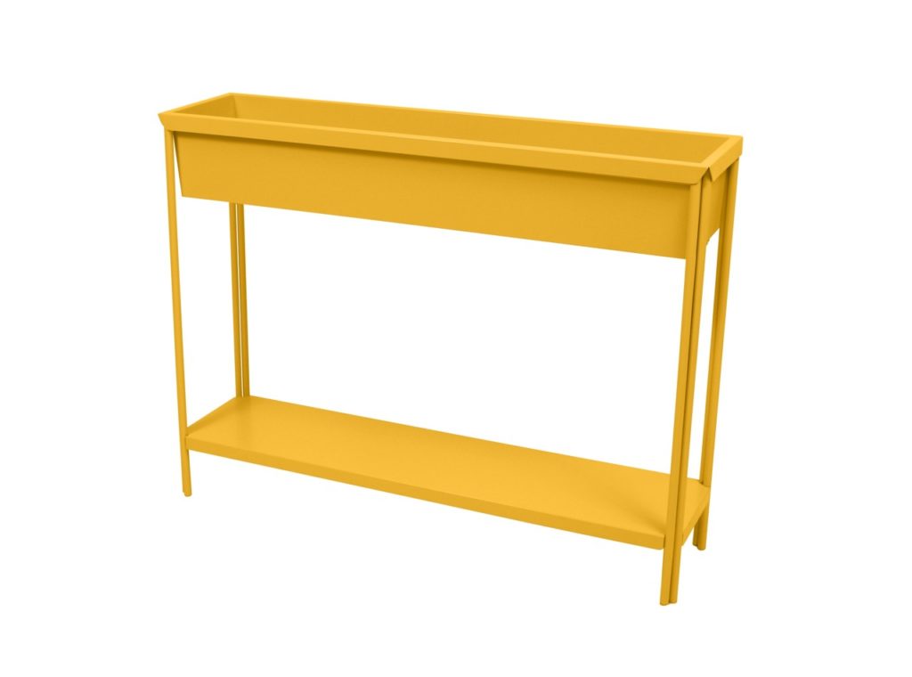 Une usine de métal jaune se trouve sur un fond blanc.