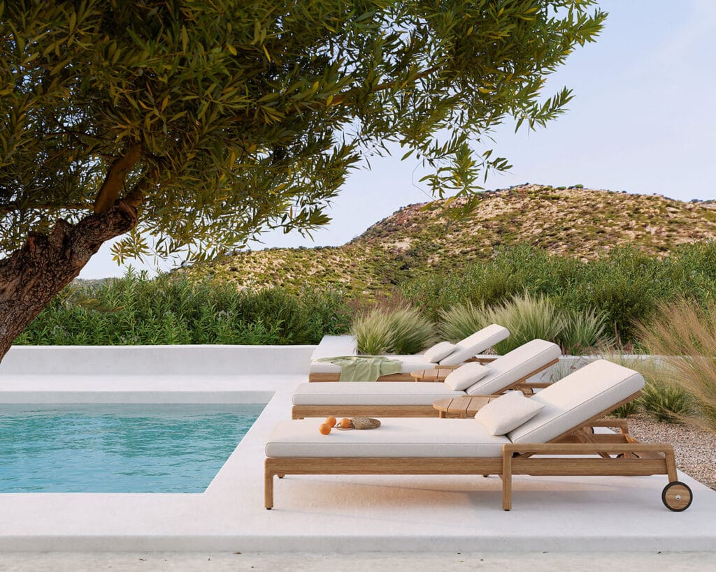 Une piscine avec Coussin pour chaise longue Jack et un arbre.