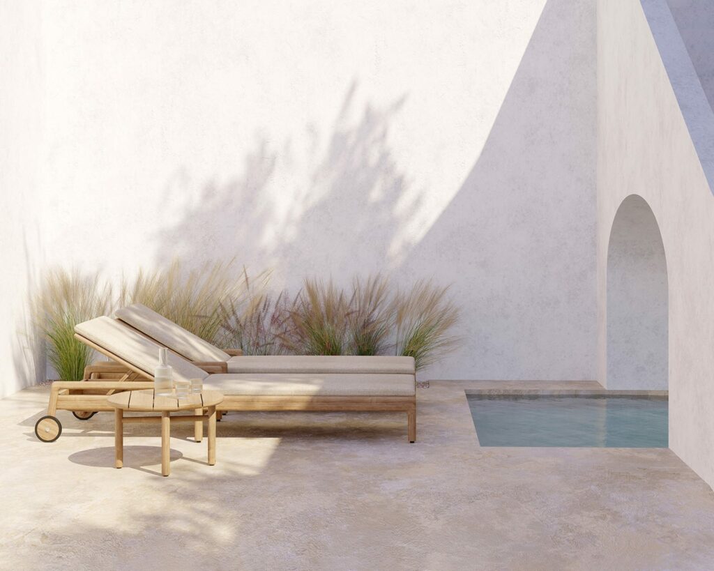 Un espace salon extérieur avec des chaises Coussin pour chaise longue Jack et une piscine.