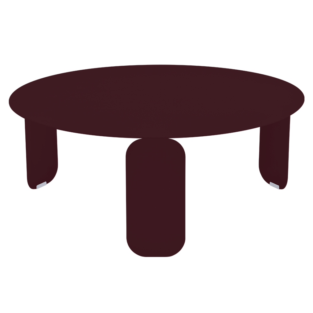 Une Table basse Bebop bordeaux, diam 80 cm avec deux pieds sur fond noir.