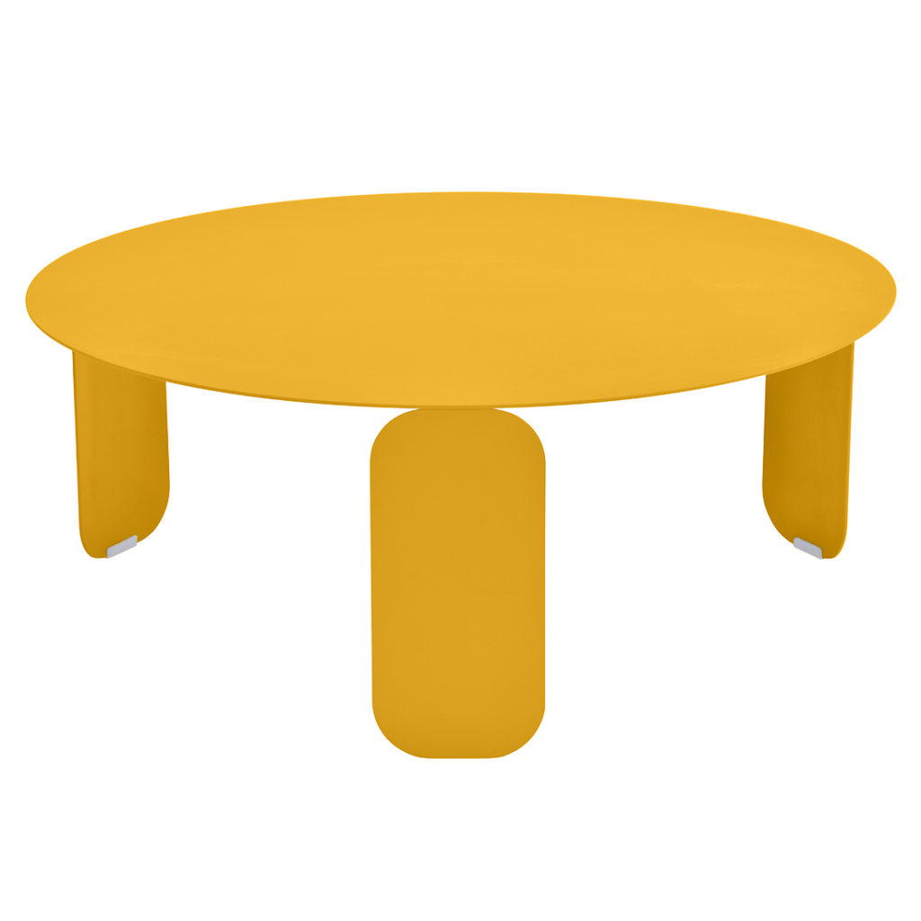 Une table ronde jaune avec deux pieds sur fond blanc. La Table basse Bebop, diam 80 cm, est utilisée comme table basse de style bebop.