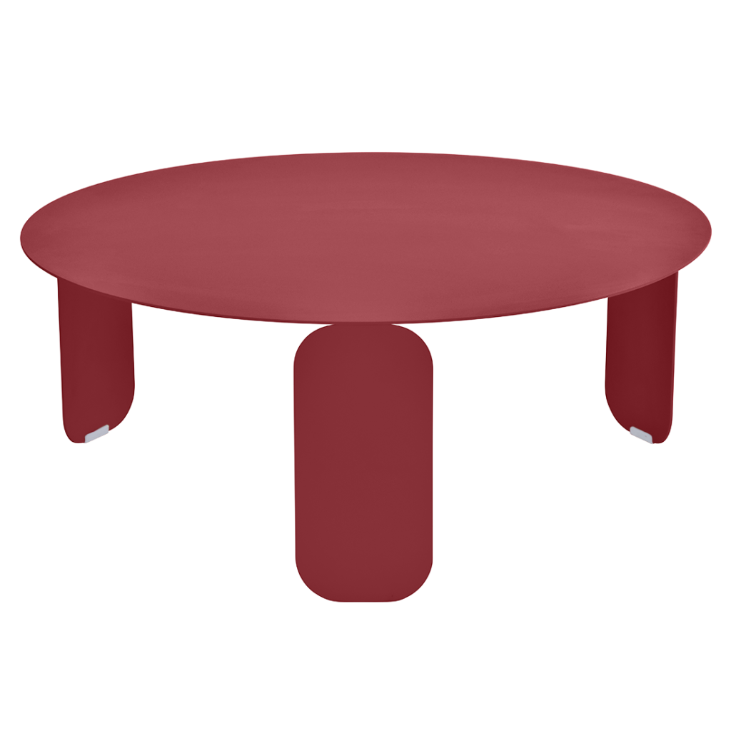 Une Table basse Bebop, diam 80 cm avec deux pieds de couleur bordeaux.