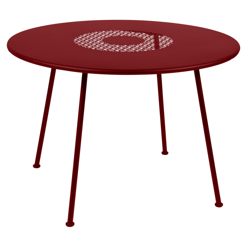 Une table ronde avec des pieds en métal et un plateau rouge.