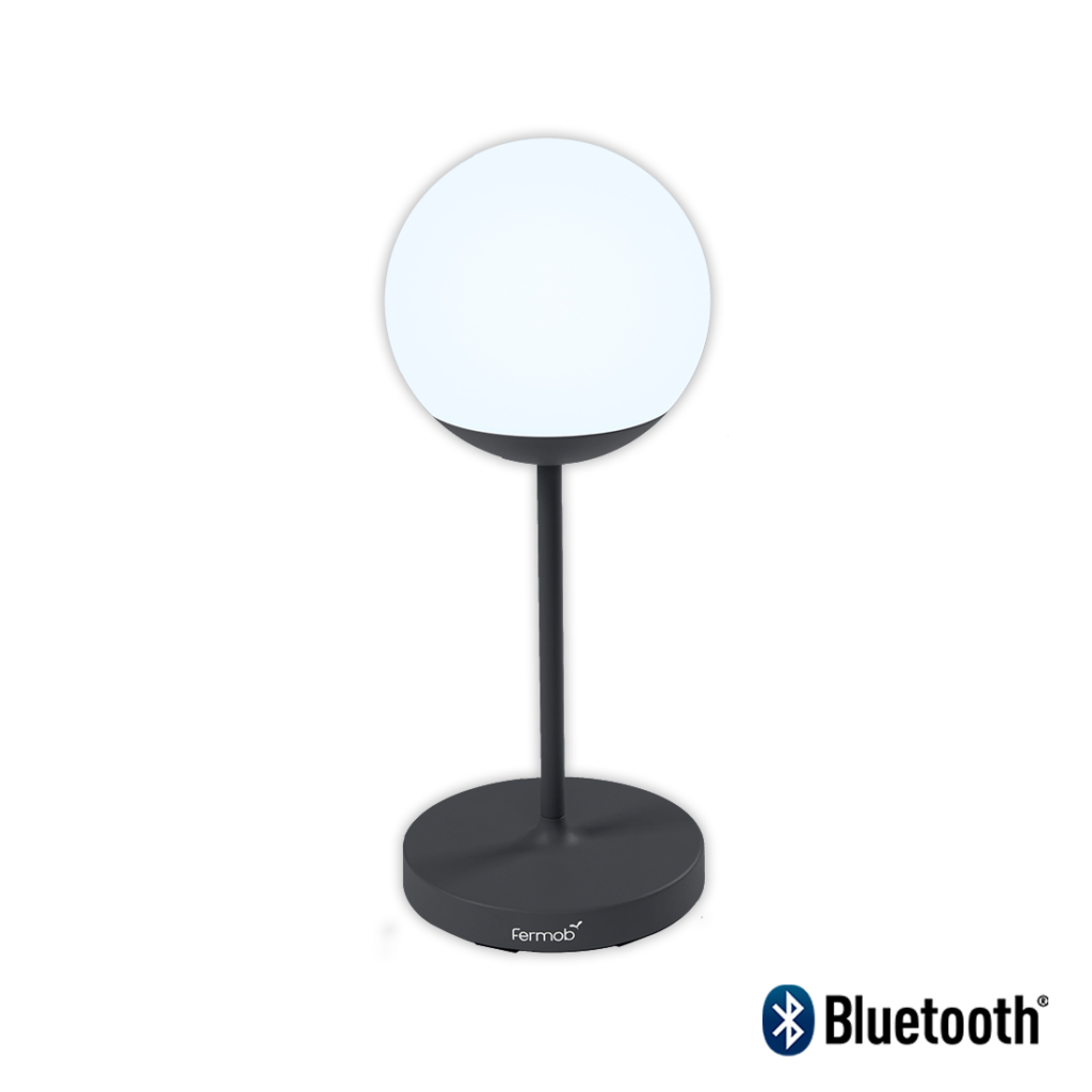 Une lampe de table noire avec une lumière bleue, qui ressemble à la Lampe Mooon ! M.