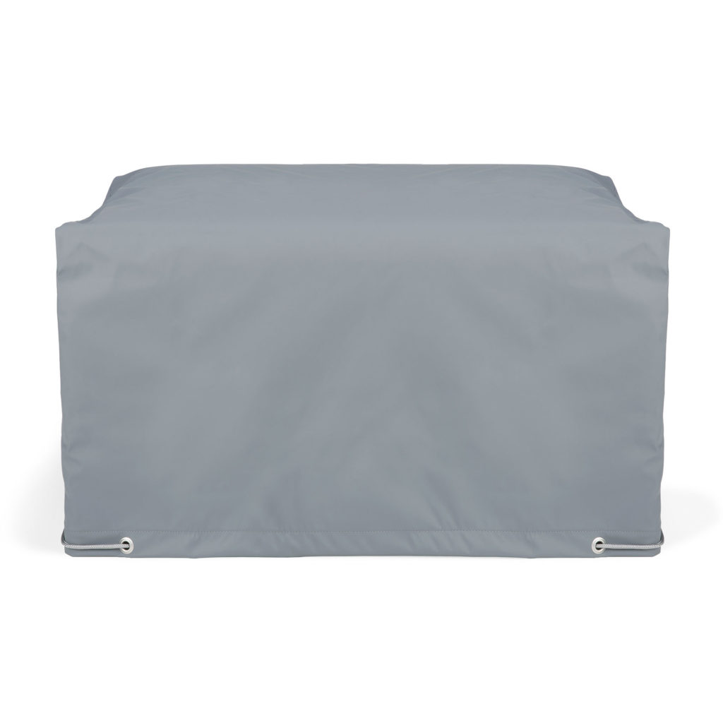 Une Housse imperméable grise imperméable pour repose-pieds Jack pour une table.