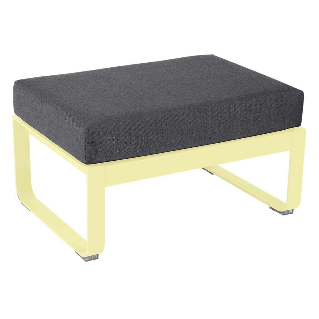 Un pouf jaune et gris avec un coussin jaune.