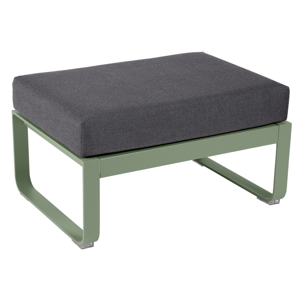 Un pouf vert avec un coussin gris.