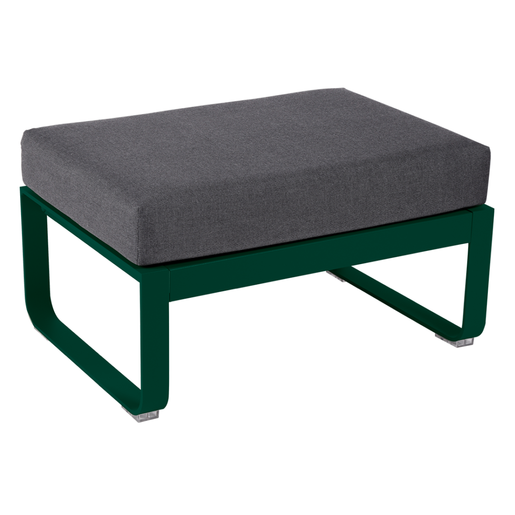 Un pouf vert avec un coussin gris.