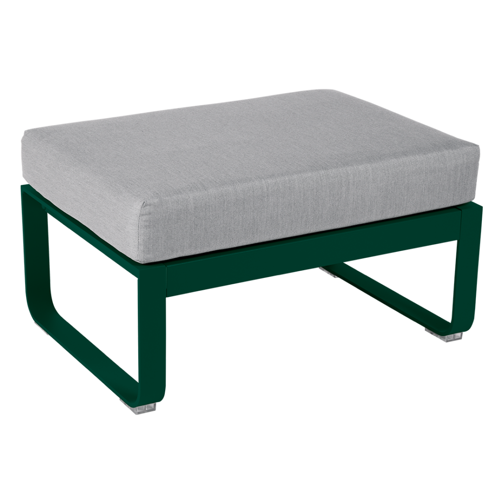 Un pouf vert avec un coussin gris.