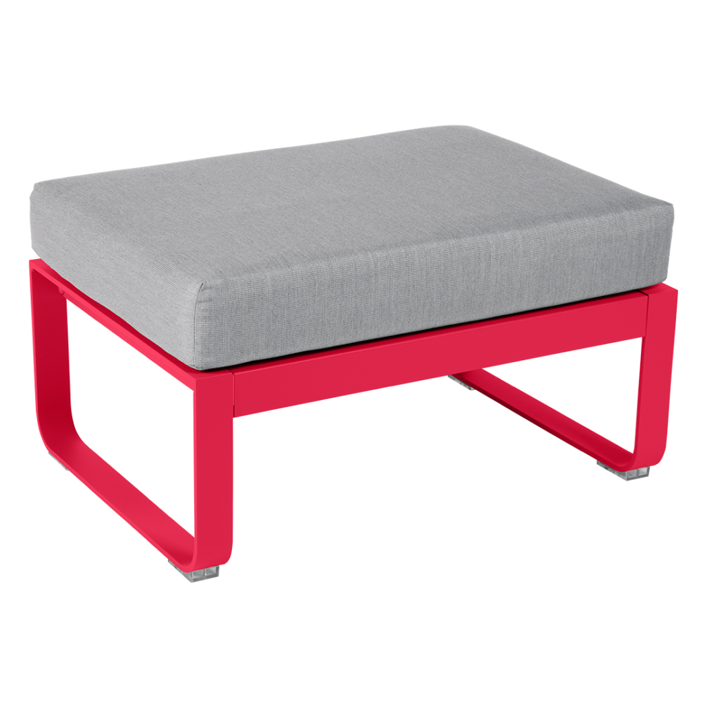 Un pouf rose et gris avec un coussin.