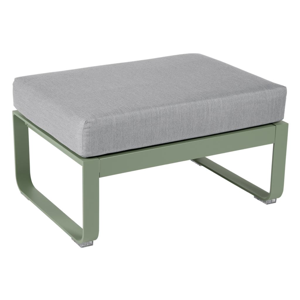 Un pouf vert avec un coussin gris.