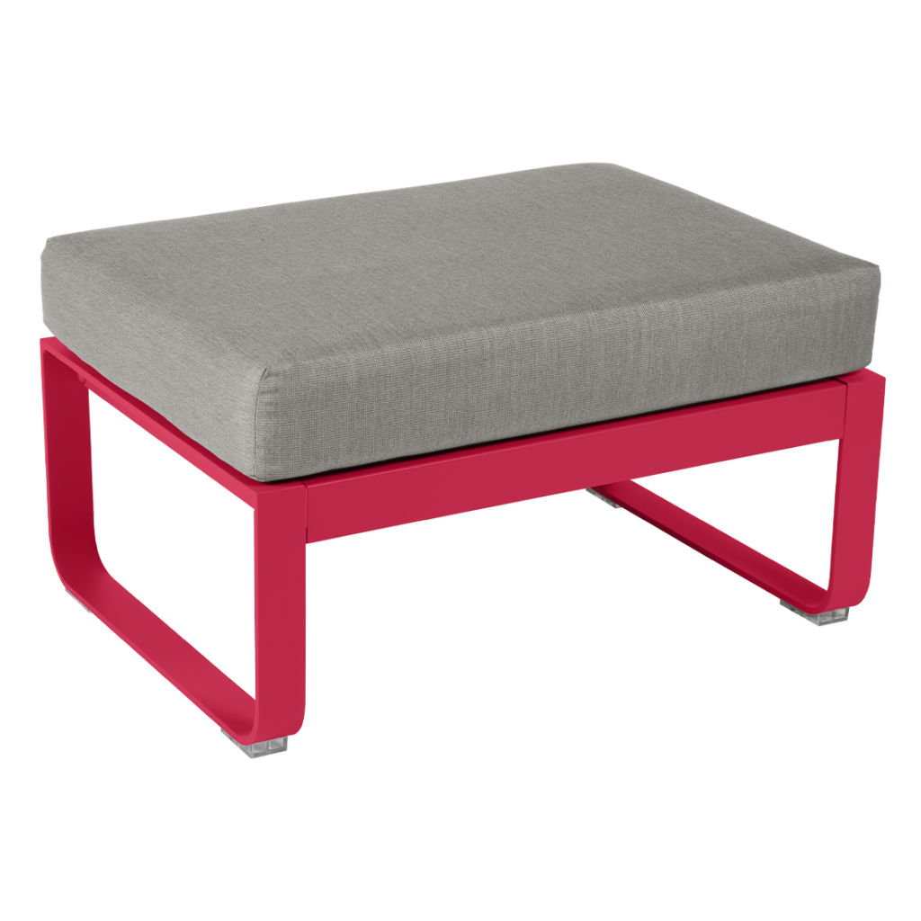 Un pouf rose et gris avec un coussin.