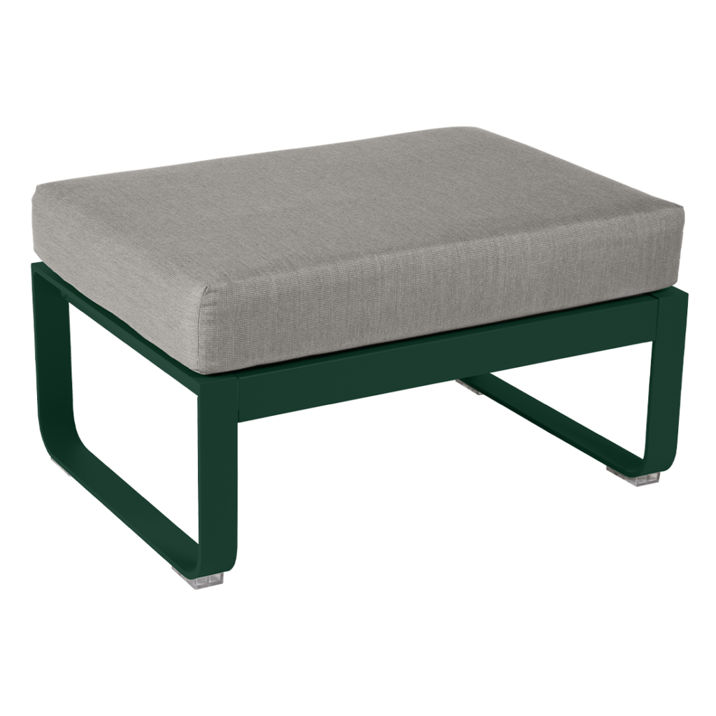 Un pouf vert avec un coussin gris.