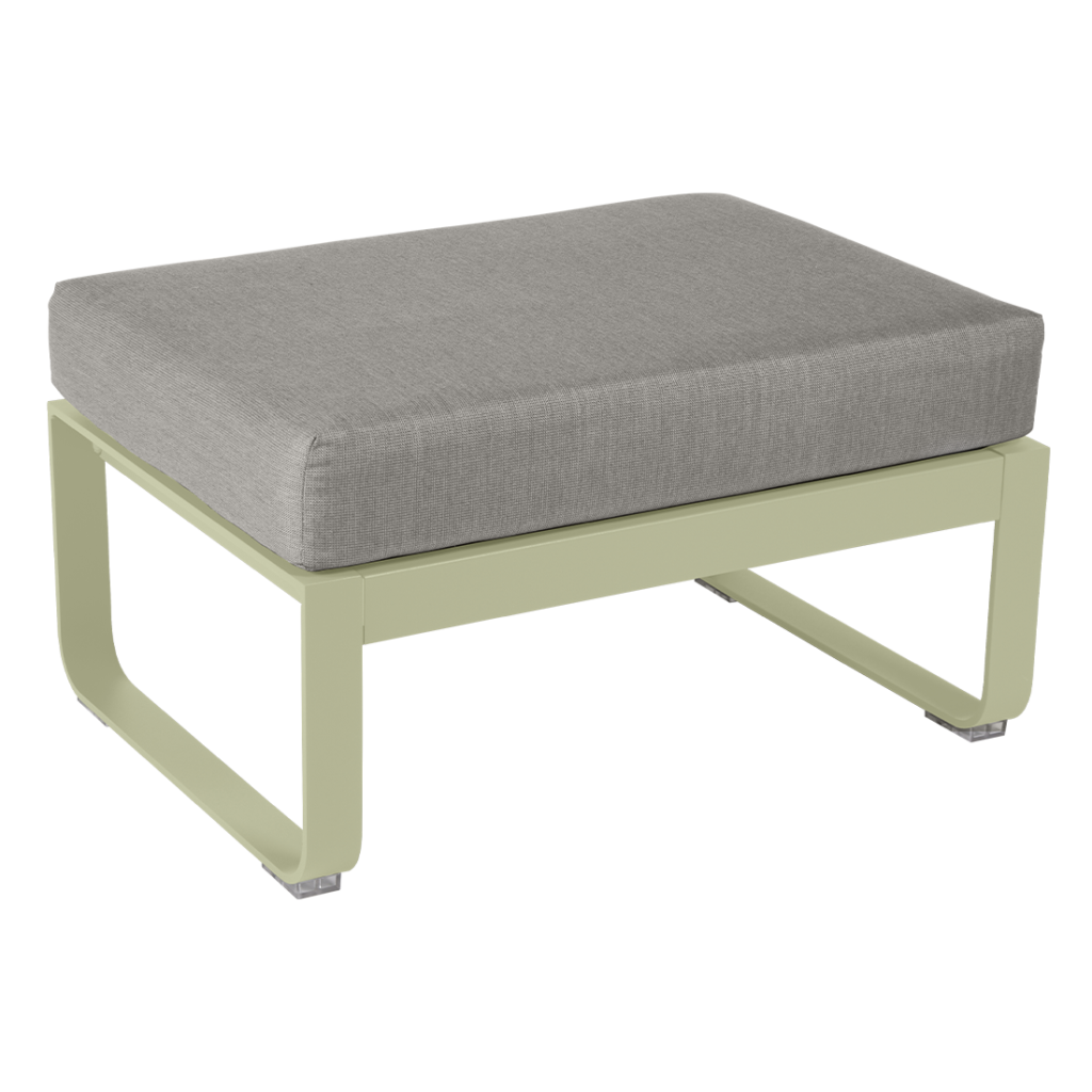 Un pouf gris et vert avec un coussin.
