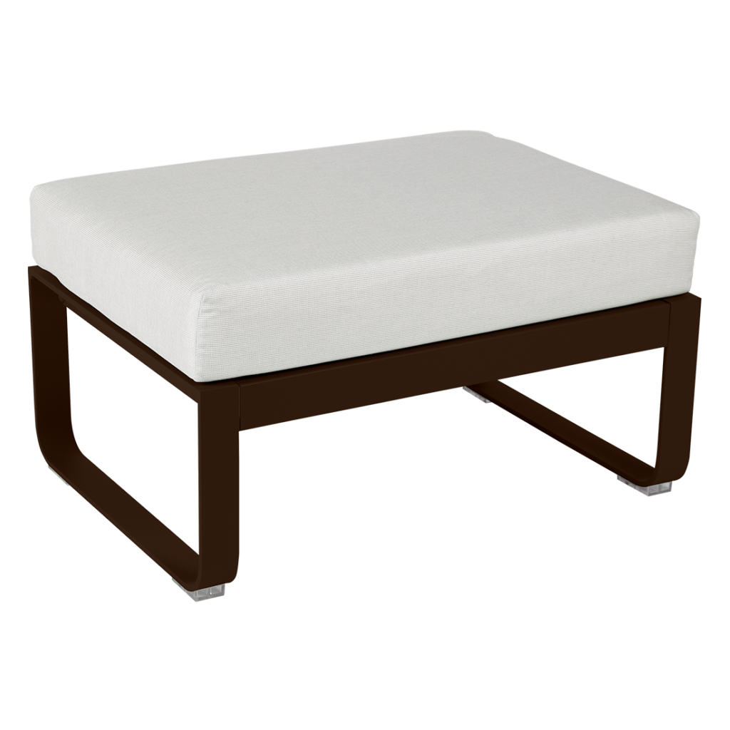 Un pouf marron et blanc avec un coussin blanc.