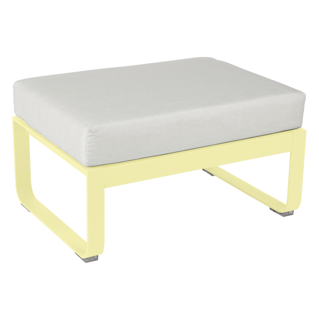 Un pouf jaune avec un coussin gris.