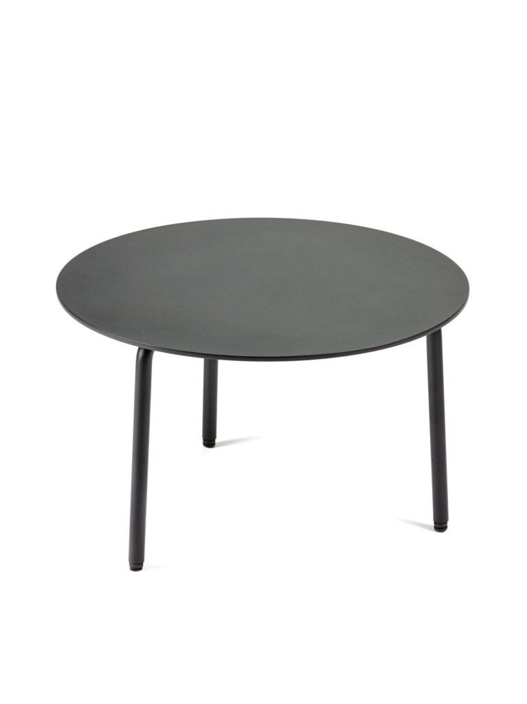 Une table ronde avec pieds noirs sur fond blanc.