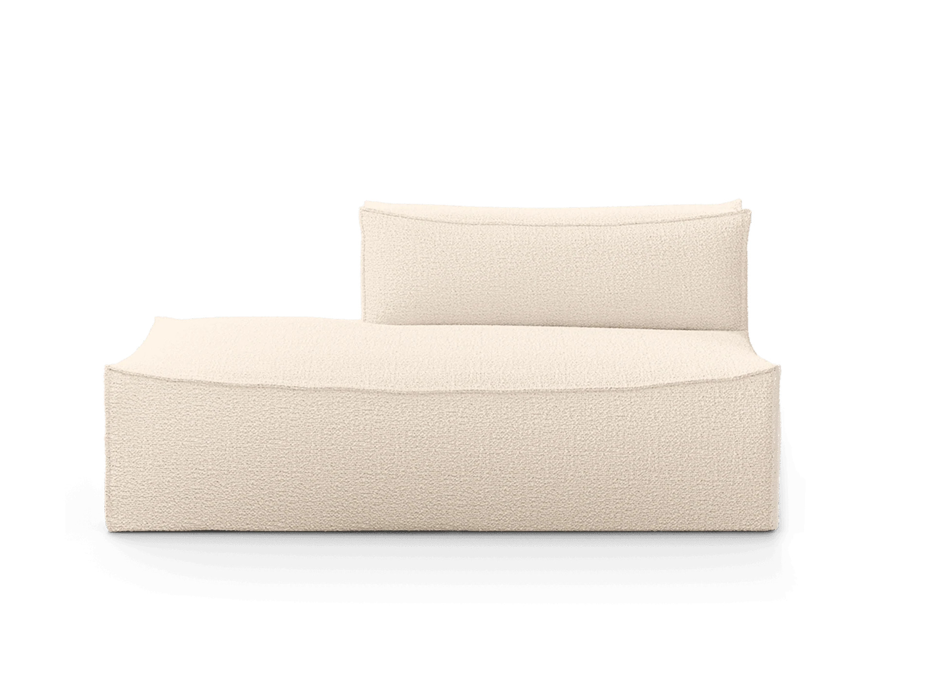 Un canapé beige avec un coussin dessus.