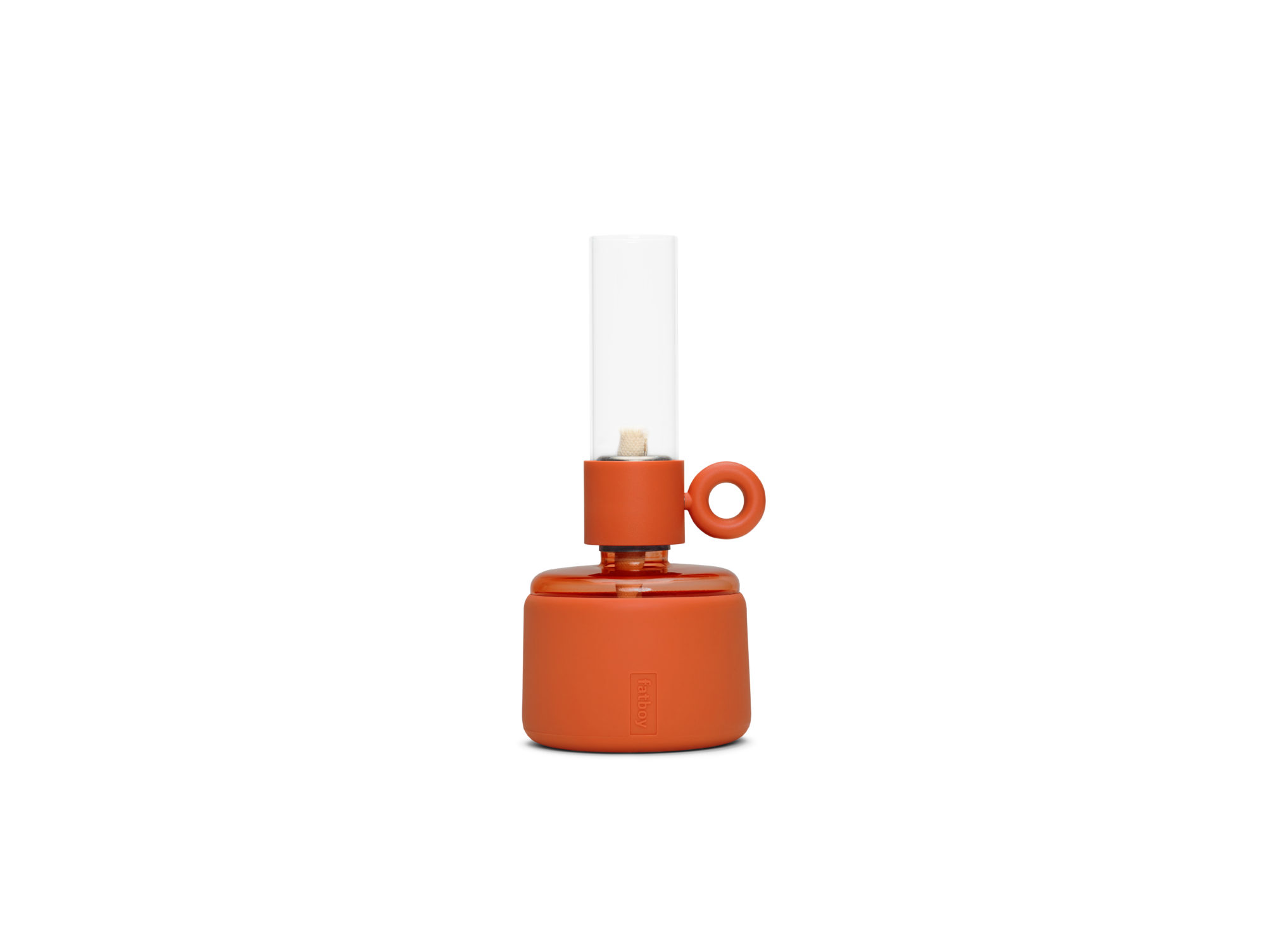 Une petite Lampe Flamtastique XS orange sur un fond blanc ajoute une touche de couleur à n'importe quel espace.